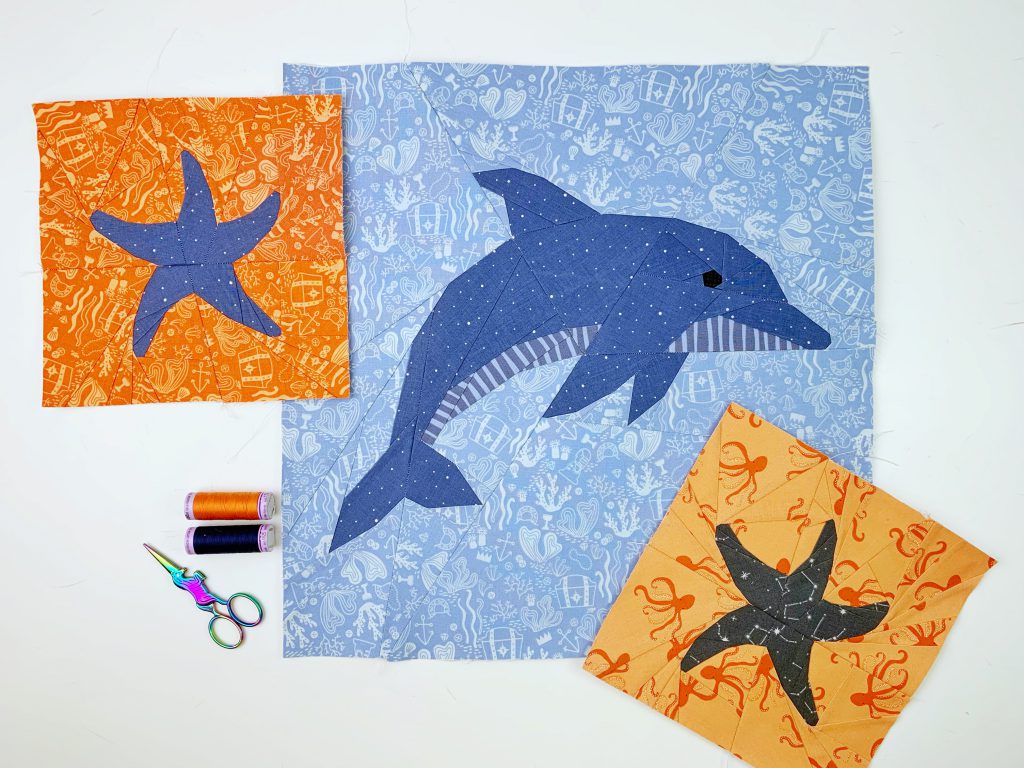 ein Delfin Quilt Block und zwei Seestern Quilt Blöcke