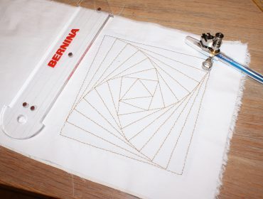 Start to quilt with the adjustable rulerfoot 72