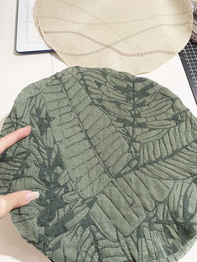 free motion quilting on a foliage print
