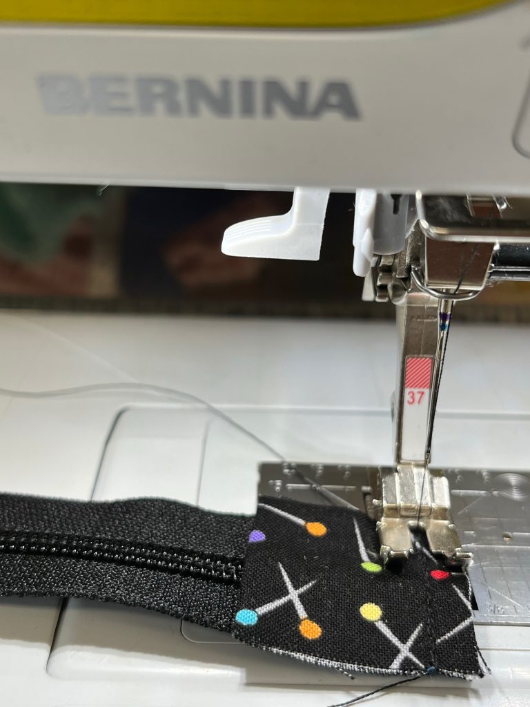 Sewing a zipper tab