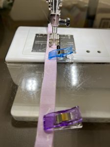 Stitching the edge of the ties