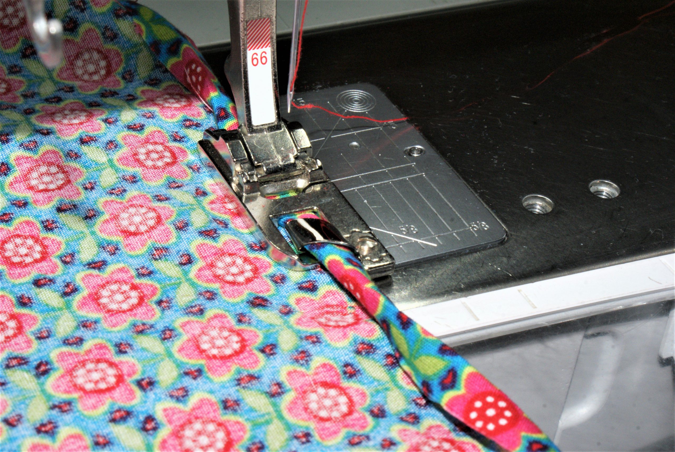 Sew a neatly hemmed infinity scarf with the Bernina 66 hemming foot