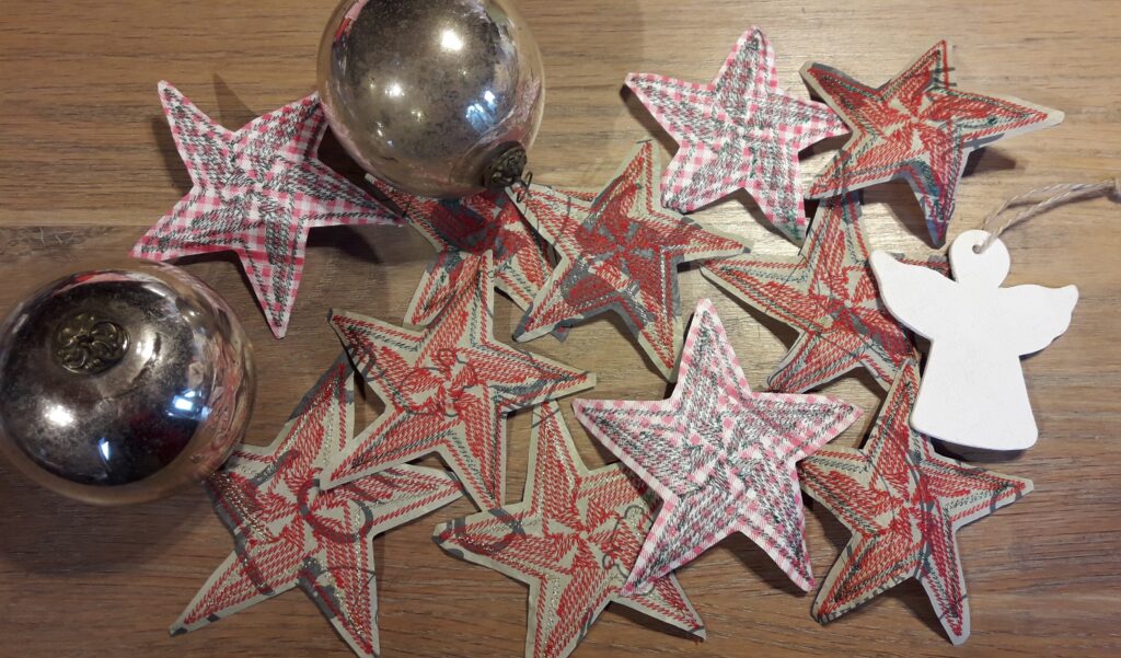 Making embroidered stars out of recycled shopping bags